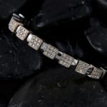 Luxurious,Diamond,Bracelet,With,Square,Settings,,Elegantly,Resting,On,Dark,